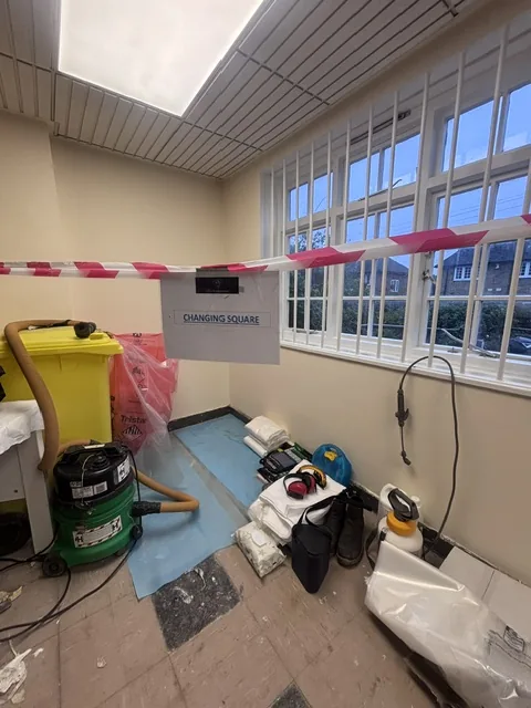 Asbestos floor tile and bitumen removal in North Finchley